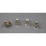 An Edwardian silver chick pin cushion and three silver thimbles including Charles Horner