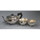 A George V silver three-piece tea service of rectangular form, gross 28.5 oz.