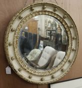 A painted circular wall mirror and a pub mirror circular W.62cm pub W.51cm