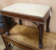 A carved mahogany dressing stool, with drop in seat W.63cm