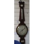 A Victorian mahogany wheel barometer, J. Broggi, Chelmsford (damage) W.30cm