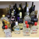 Thirty three assorted bottle of spirits, ports, sherries, liqueurs etc. including Blandy's Madeira