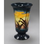 A William Moorcroft 'Reeds at Sunset' pattern vase designed by Philip Richardson, of tapered