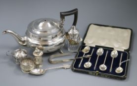 A silver teapot, a small quantity of other silver items and a 9ct gold-cased Majex wristwatch on