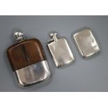 A small silver hip flask, a leather and plate-mounted hip flask and a silver cigarette case