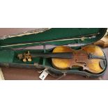 A full sized cased violin with bow