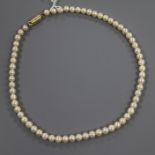 A single strand cultured pearl necklace, with 9ct gold clasp, 36cm.