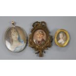 A small 18th century oil on ivory miniature of a lady, 3 x 2.5cm and two other miniatures