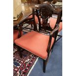 A set of six 19th century mahogany shield-back dining chairs and six matching reproduction chairs