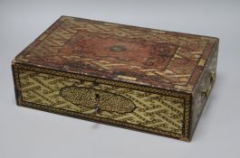 A Chinese export lacquer artist's box, containing ceramic dishes