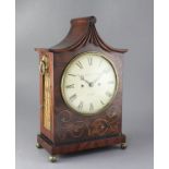 An early 19th century brass inlaid mahogany table clock, William North, York, the pagoda case with