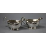 A pair of modern silver sauceboats, Birmingham, 1965/6, 12 oz.