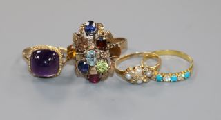 A 14ct gold and multi gem set cocktail ring and three other gem set rings including 9ct gold and