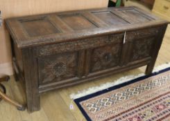 A late 18th century carved oak coffer W.143.5cm