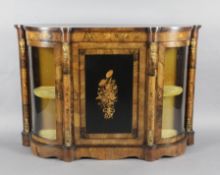 A 19th century French marquetry inlaid walnut side cabinet, with central floral inlaid panelled door