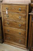 An oak five drawer chest W.77cm