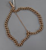 An Edwardian 9ct gold albert chain, 32cm.