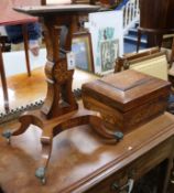 A Regency rosewood and marquetry inlaid teapoy, the sarcophagus caddy top opening to reveal two