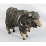 An 18th / 19th century naturalistically carved figure of a ram, L.35.5in.