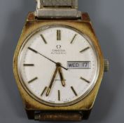 A gentleman's steel and gold plated Omega day/date automatic wrist watch.