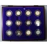 A Royal Mint Coronation Anniversary Silver Proof Collection, twelve fifty pence coins, 2003, boxed