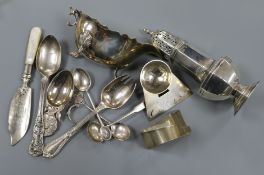A silver sugar caster, a sauceboat (damaged) and a small quantity of other items