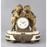 An early 20th century French ormolu mounted marble mantel clock, retailed by Charles Frodsham, the