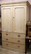 A Victorian stripped pine linen press W.128cm