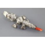 A 19th century silver child's rattle, with four (ex8?) bells and coral teether (af), indistinct