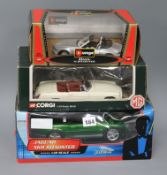 A boxed Corgi MG James Bond 007 Jaguar, an XKR Roadster and a BMX Roadster