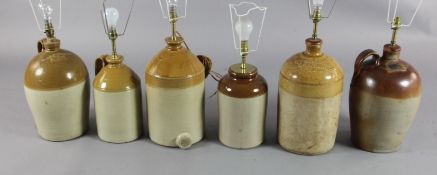 A collection of six Victorian earthenware jars, including a wine flagon incised Vallance, Catt & Co,