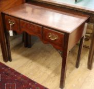 A George III mahogany lowboy, with three drawers W.84cm