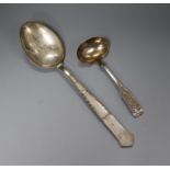 A Danish white metal basting? spoon and a Danish white metal sauce ladle.