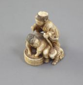 A Japanese ivory okimono of a family group, Meiji period, unsigned, 4.5cm highProvenance: