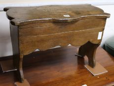 A 17th century style oak stool W.60cm