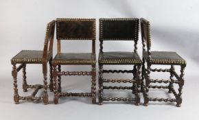 Two pairs of mid 17th century Hispano-Flemish walnut chairs, with brass nailed upholstery, on spiral