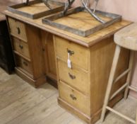 A Victorian pine kneehole dressing table W.121cm