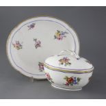 A Sevres quatrelobed dish and a similar ecuelle and cover, c.1753 and 1763, both painted with floral