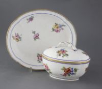 A Sevres quatrelobed dish and a similar ecuelle and cover, c.1753 and 1763, both painted with floral