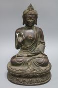 A large bronze Chinese Buddha height 38cm