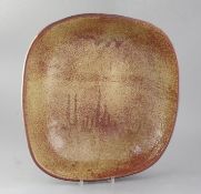 Pierre Culot (Belgian 1938-2011). A red/brown-glazed large stoneware dish, 'C' monogram to base,