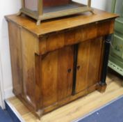 A mid 19th century fruitwood cupboard, fitted with a frieze drawer over doors W.81cm