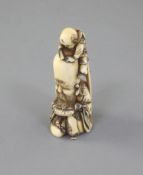 A Japanese ivory netsuke of Fukurokuju and a boy, 19th century, signed Minkoku, the boy at the top