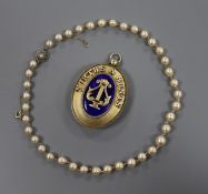 A cultured pearl and diamond set clasp necklace and silver gilt masonic pendant.