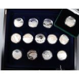 Royal Mint 2003 Solomon Islands History of Powered Flight $25 silver proof 13-coin set, and a single