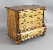 A mid 18th century Dutch pinewood ogee shaped chest, with four long drawers, on bowed base, W.3ft