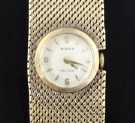 A lady's 9ct gold Rolex precision manual wind bracelet wrist watch, with baton numerals, overall