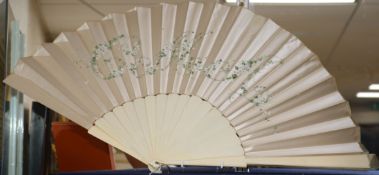 A large bone and cream silk fan painted with a monogram, c.1900 length 46cm