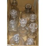 Nine cut glass decanters