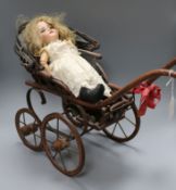 A Victorian doll's pram and a German bisque head doll doll 36cm